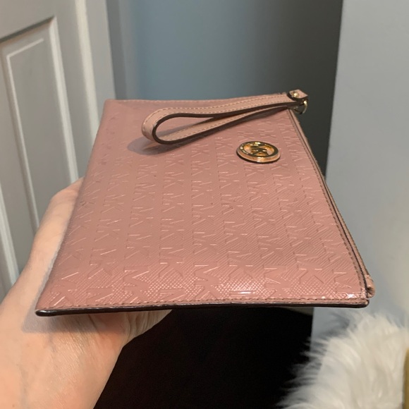 Authentic soft pink patent leather large wristlet clutch by Michael Kors